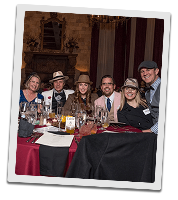 Baltimore Murder Mystery party guests at the table