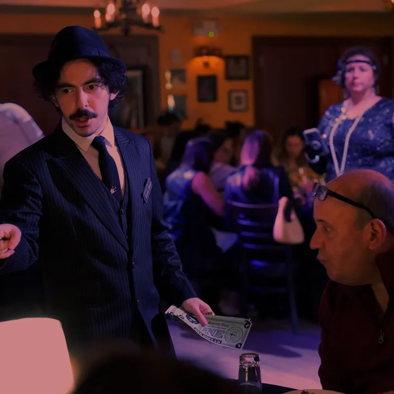A detective questioning a guest at a Baltimore show
